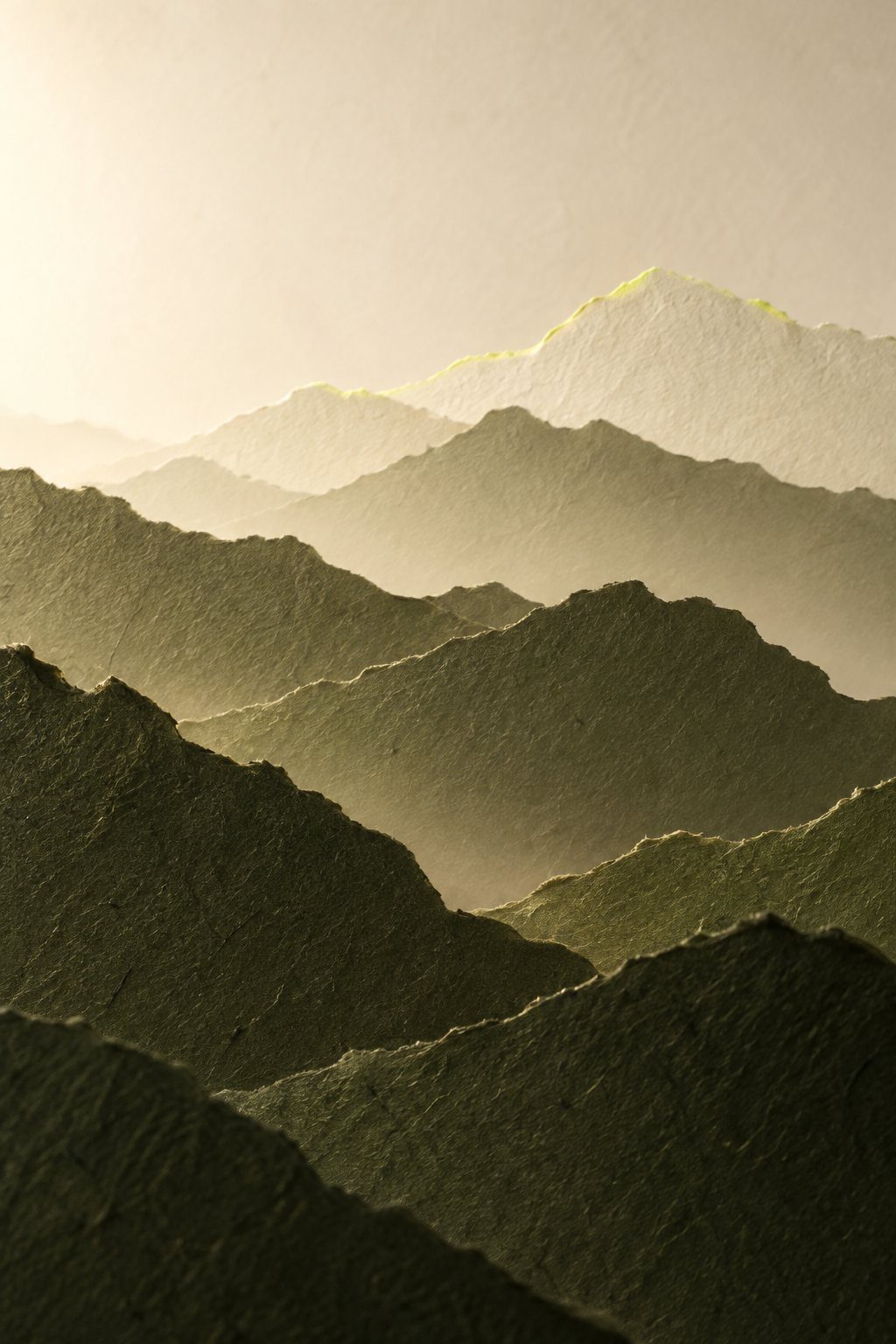 Layered olive paper ridges with a lime line